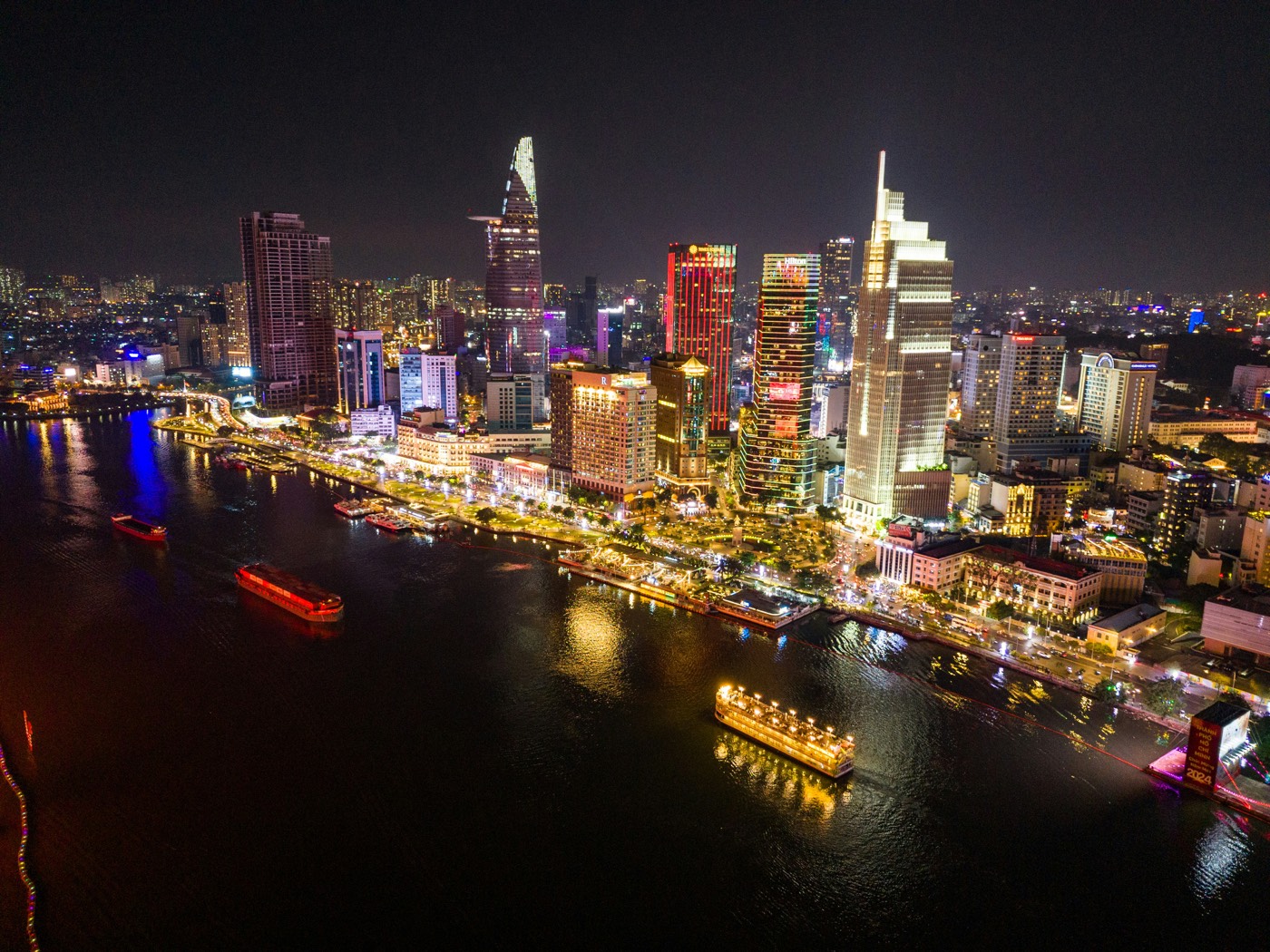 Aerial view of Ho Chi Minh City skyline at sunset, illustrating Vietnam's economic dynamism