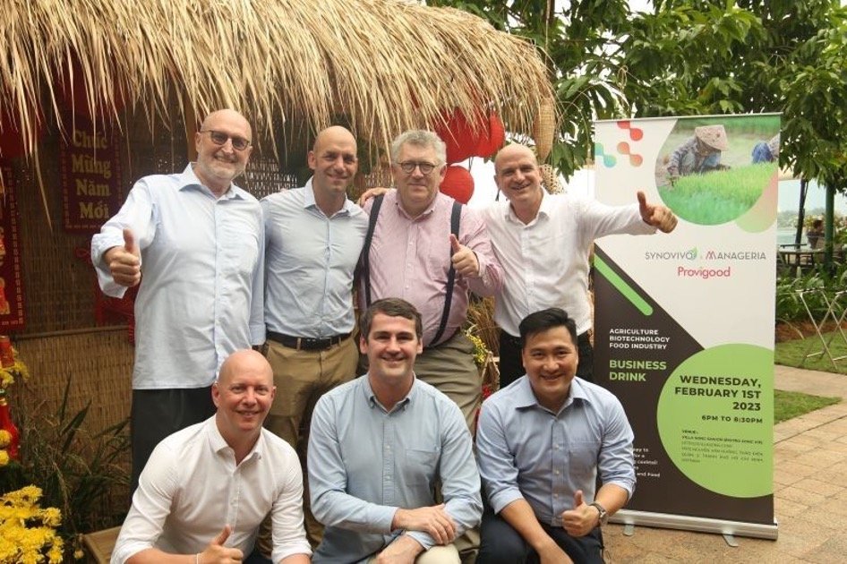 Group photo of seven people including Vincent Treluyer in front of a Synovivo, Manageria and Provigood roll-up banner at the Business Drink partnership launch, Ho Chi Minh City, February 2023.